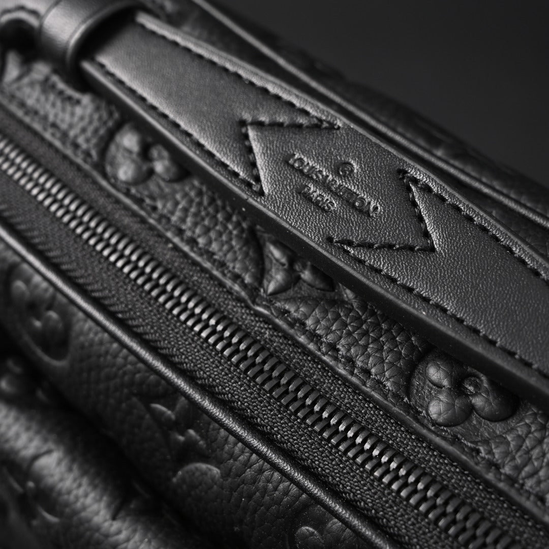 soft trunk messenger bag – monogram black taurillon
