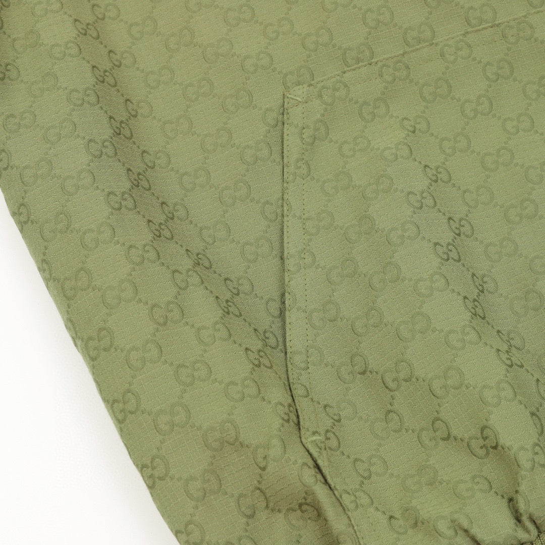 green monogram zip-up hoodie