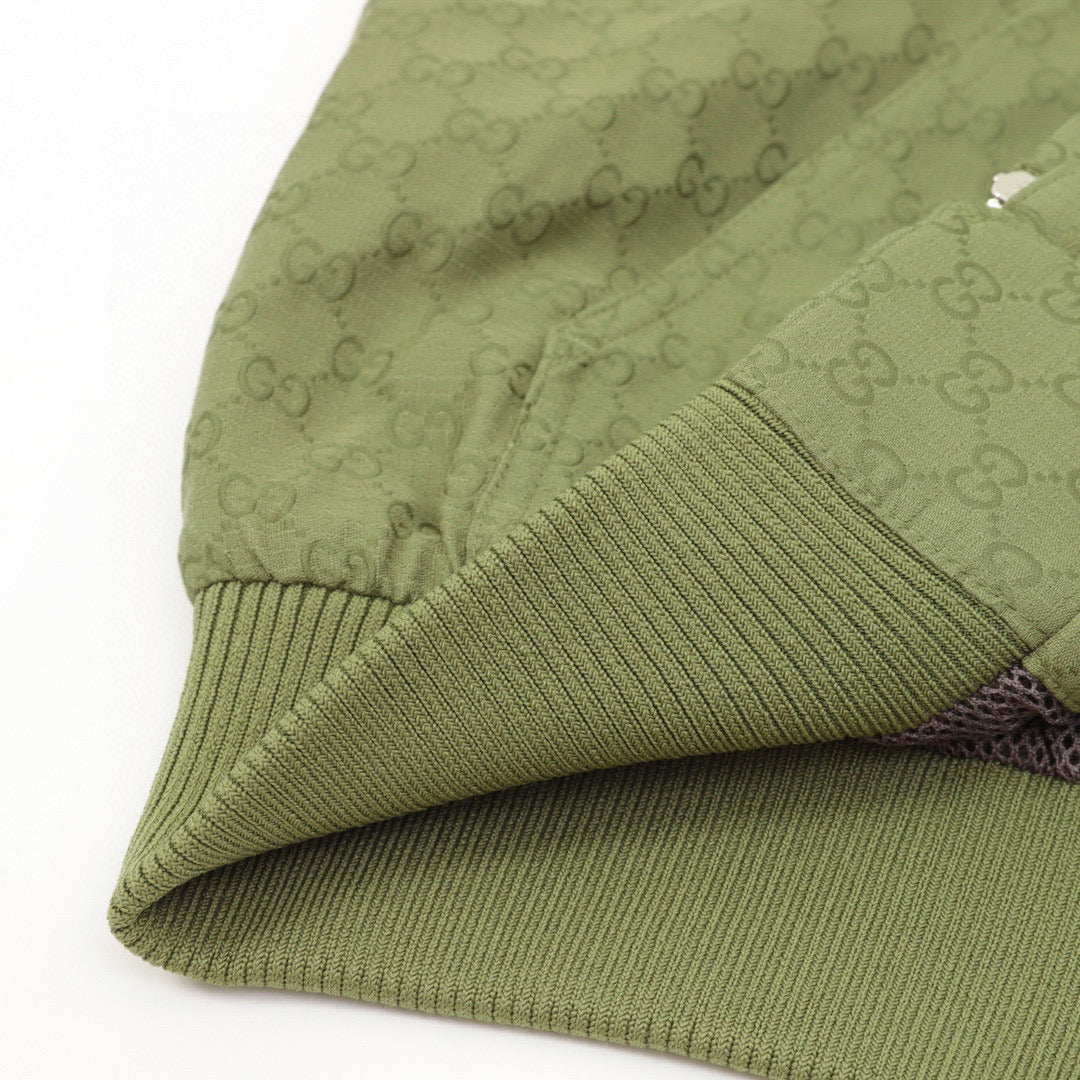 green monogram zip-up hoodie