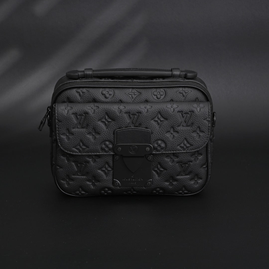 soft trunk messenger bag – monogram black taurillon
