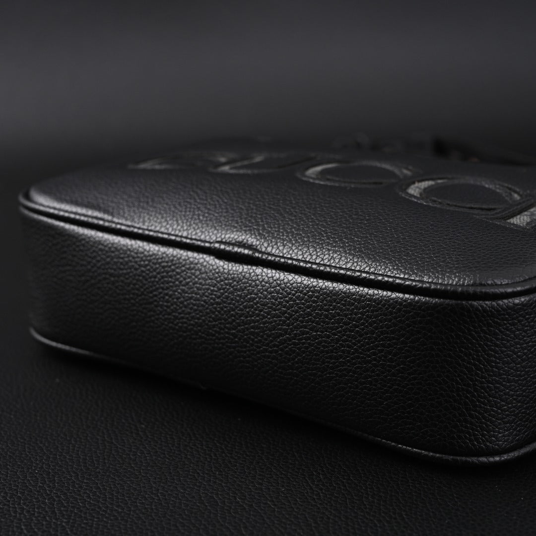 embossed leather crossbody bag