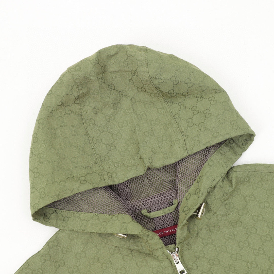 green monogram zip-up hoodie