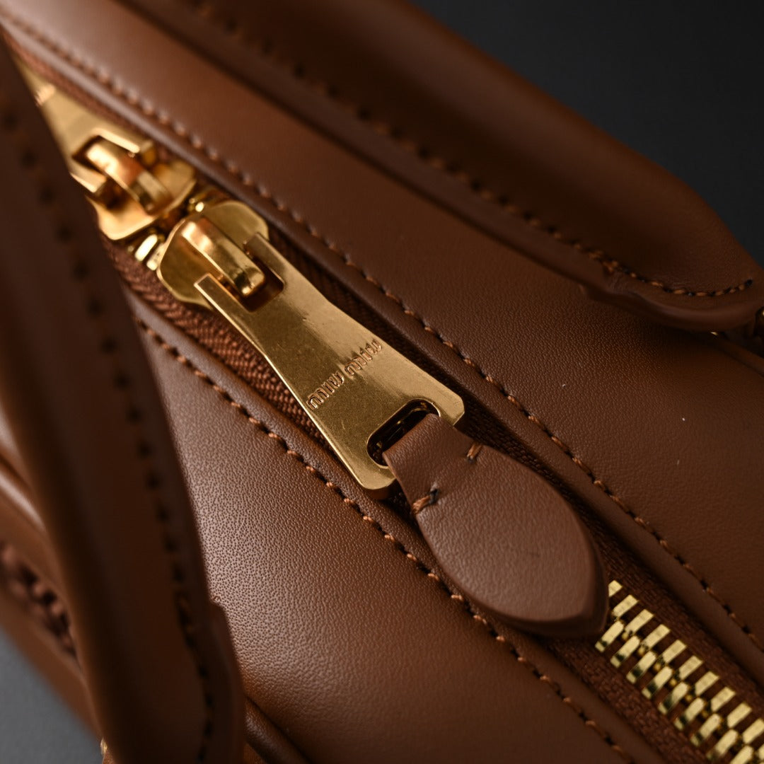 matelassé leather mini boston bag