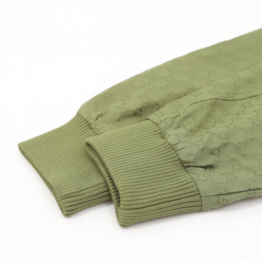 green monogram zip-up hoodie
