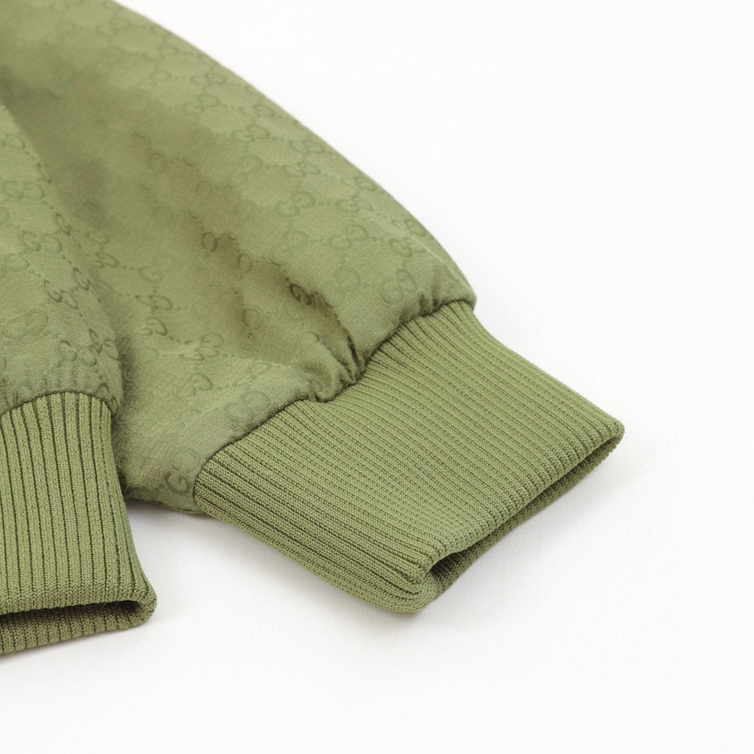green monogram zip-up hoodie