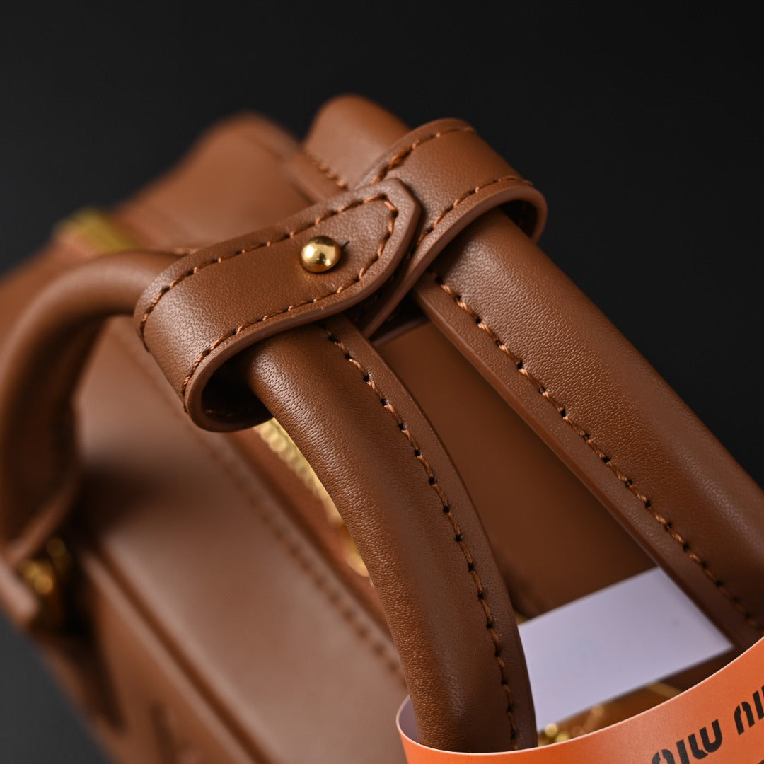matelassé leather mini boston bag