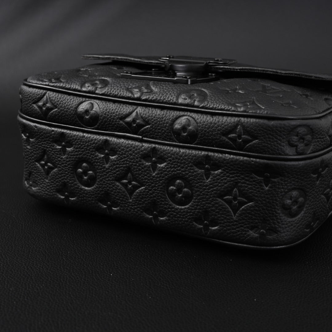 soft trunk messenger bag – monogram black taurillon