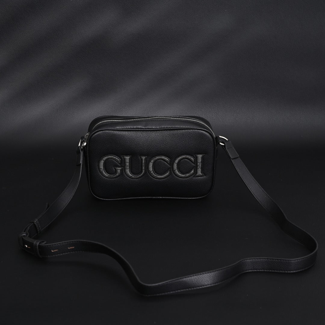 embossed leather crossbody bag