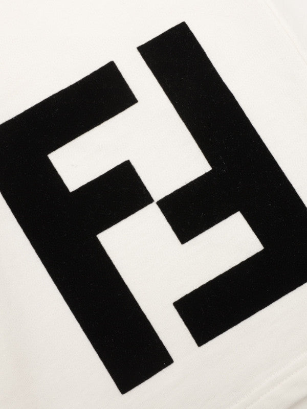 white logo print shorts