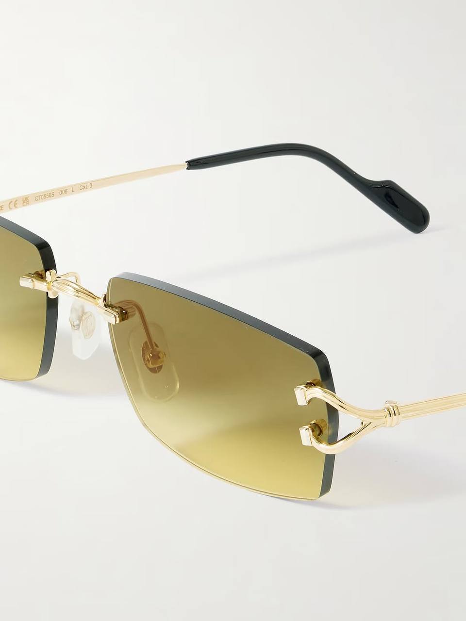 gold rimless sunglasses