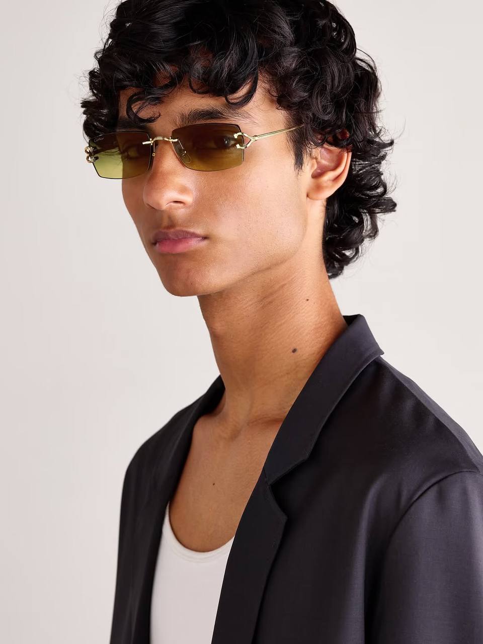 gold rimless sunglasses
