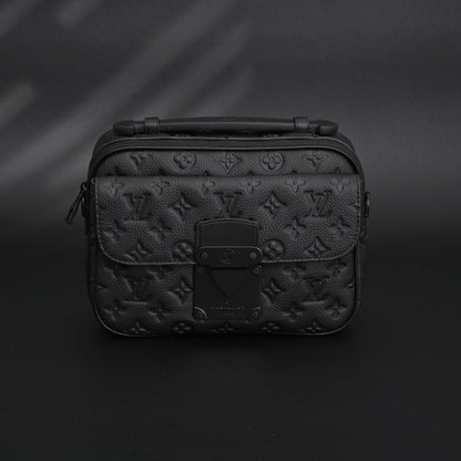 Soft Trunk Messenger Bag – Monogram Black Taurillon