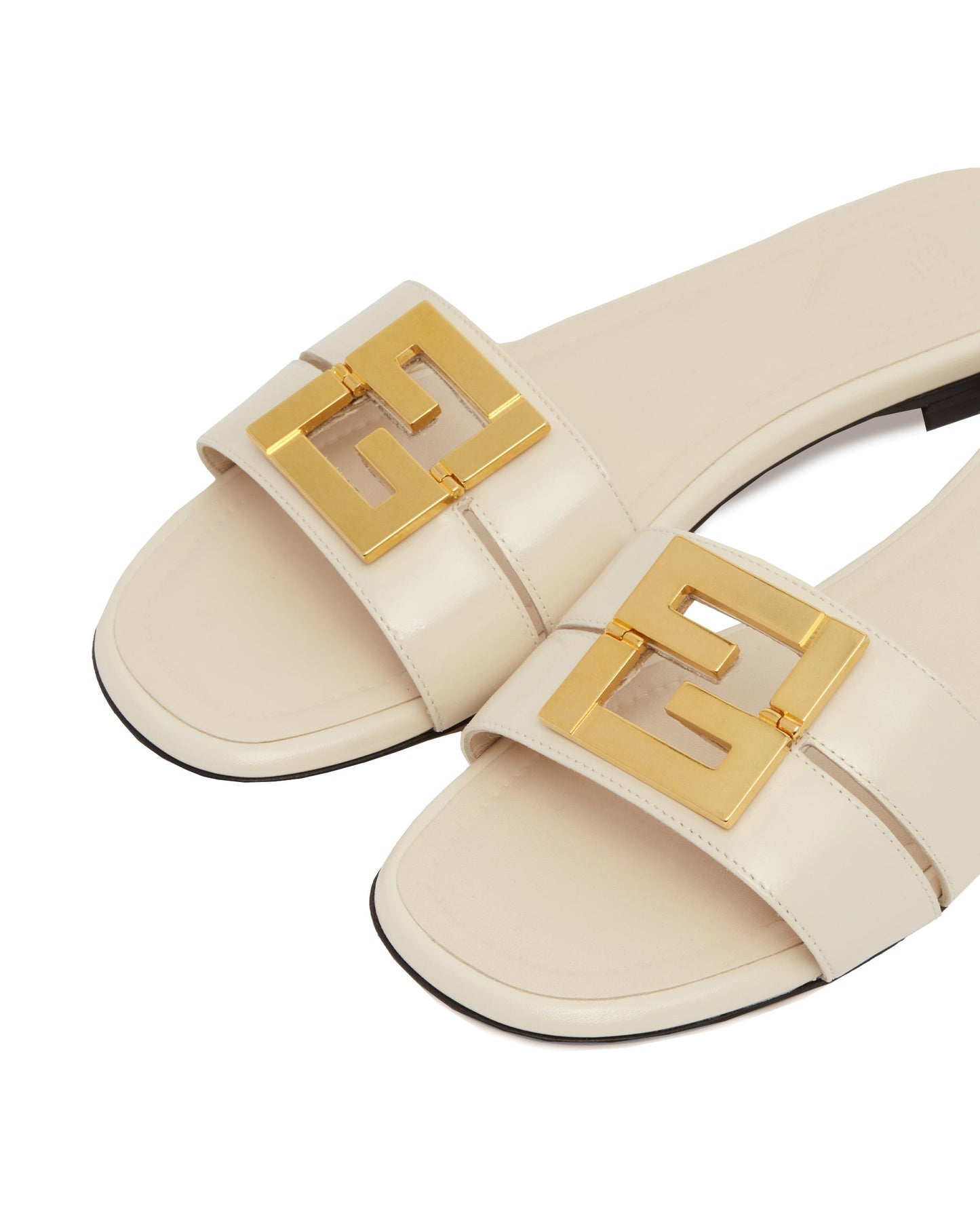 ffold white flat sandals